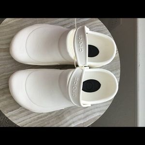 Brand new White Crocs.